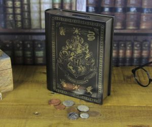 Read more about the article Harry Potter Book Piggy Bank<span class="rmp-archive-results-widget "><i class=" rmp-icon rmp-icon--ratings rmp-icon--thumbs-up rmp-icon--full-highlight"></i><i class=" rmp-icon rmp-icon--ratings rmp-icon--thumbs-up rmp-icon--full-highlight"></i><i class=" rmp-icon rmp-icon--ratings rmp-icon--thumbs-up rmp-icon--full-highlight"></i><i class=" rmp-icon rmp-icon--ratings rmp-icon--thumbs-up rmp-icon--full-highlight"></i><i class=" rmp-icon rmp-icon--ratings rmp-icon--thumbs-up rmp-icon--half-highlight js-rmp-replace-half-star"></i> <span>4.5 (231)</span></span>
