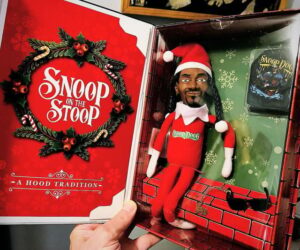Read more about the article Snoop On The Stoop Christmas Doll